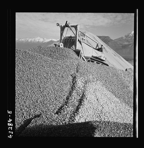 Untitled photo, possibly related to: Columbia Steel Company at Geneva, Utah. Bulldozer handling gravel for concrete during the construction of a new steel mill which will make important additions to the vast amount of steel needed for the war effort