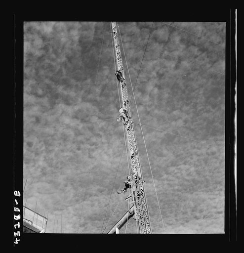 Untitled photo, possibly related to: Columbia Steel Company at Geneva, Utah. Surveyor running lines for a water intake tunnel to serve a new steel mill under construction which will make important additions to the vast amount of steel needed for the war effort