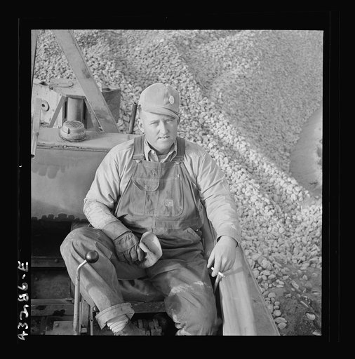 Untitled photo, possibly related to: Columbia Steel Company at Geneva, Utah. Bulldozer operator who helps in the construction of a new steel mill which will make important additions to the vast amount of steel needed for the war effort