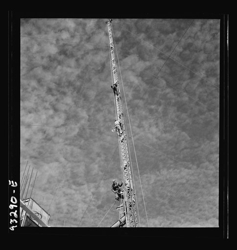 Untitled photo, possibly related to: Columbia Steel Company at Geneva, Utah. Surveyor running lines for a water intake tunnel to serve a new steel mill under construction which will make important additions to the vast amount of steel needed for the war effort