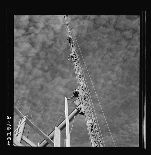 Untitled photo, possibly related to: Columbia Steel Company at Geneva, Utah. Surveyor running lines for a water intake tunnel to serve a new steel mill under construction which will make important additions to the vast amount of steel needed for the war effort