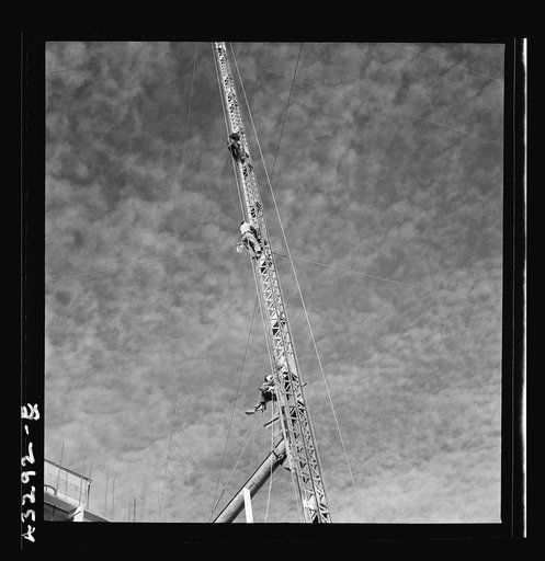 Untitled photo, possibly related to: Columbia Steel Company at Geneva, Utah. Surveyor running lines for a water intake tunnel to serve a new steel mill under construction which will make important additions to the vast amount of steel needed for the war effort