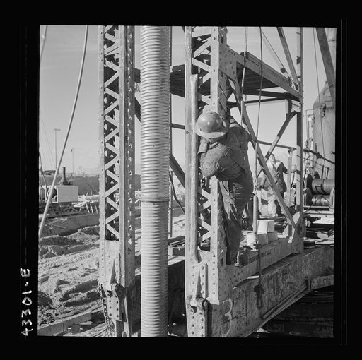Columbia Steel Company at Geneva, Utah. Metal casings for concrete piles that will serve as foundations for a new steel mill