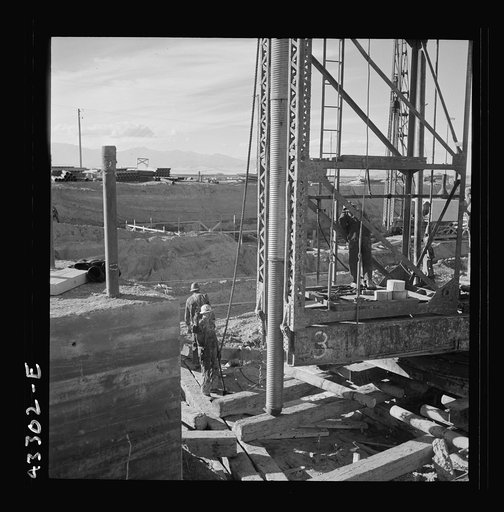 Columbia Steel Company at Geneva, Utah. Metal casings for concrete piles that will serve as foundations for a new steel mill