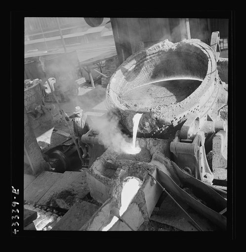Untitled photo, possibly related to: Columbia Steel Company at Ironton, Utah. Pouring a heat of iron