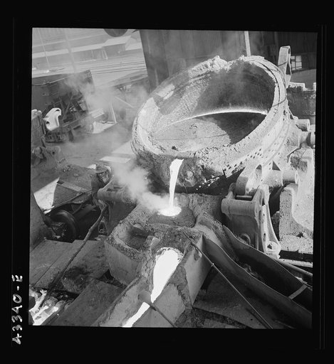 Untitled photo, possibly related to: Columbia Steel Company at Ironton, Utah. Pouring a heat of iron
