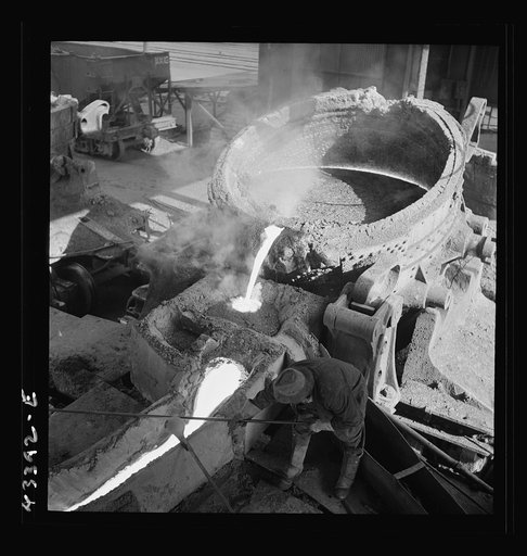 Untitled photo, possibly related to: Columbia Steel Company at Ironton, Utah. Pouring a heat of iron