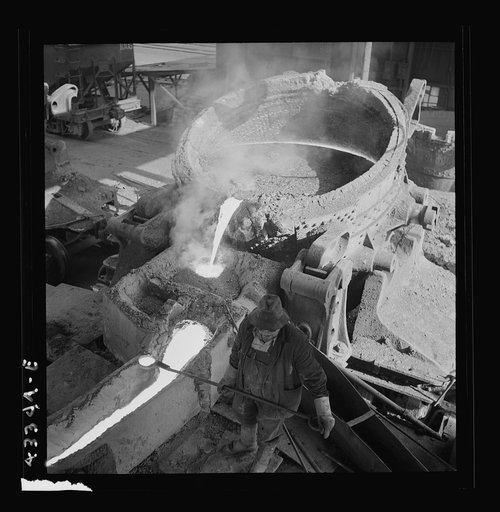Columbia Steel Company at Ironton, Utah. Pouring a heat of iron