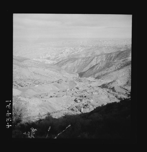 Untitled photo, possibly related to: New Idria, California. A birds-eye view of New Idria showing vicinity of the mine workings and, in the valley, the mercury extraction plant of the New Idria Quicksilver Mining Company