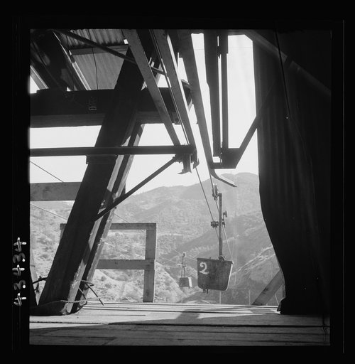Untitled photo, possibly related to: New Idria, California. An aerial tramway which carries cinnabar ore from mines to the New Idria Quicksilver Mining Company's mercury extraction plant close by