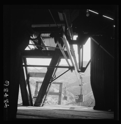 Untitled photo, possibly related to: New Idria, California. An aerial tramway which carries cinnabar ore from mines to the New Idria Quicksilver Mining Company's mercury extraction plant close by