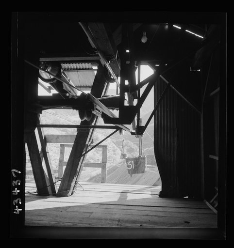 Untitled photo, possibly related to: New Idria, California. An aerial tramway which carries cinnabar ore from mines to the New Idria Quicksilver Mining Company's mercury extraction plant close by