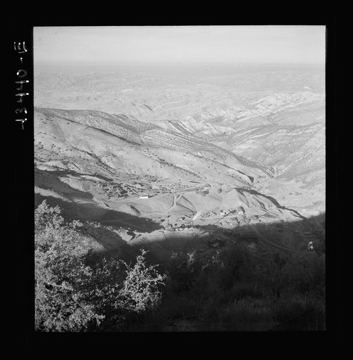 Untitled photo, possibly related to: New Idria, California. A birds-eye view of New Idria showing vicinity of the mine workings and, in the valley, the mercury extraction plant of the New Idria Quicksilver Mining Company