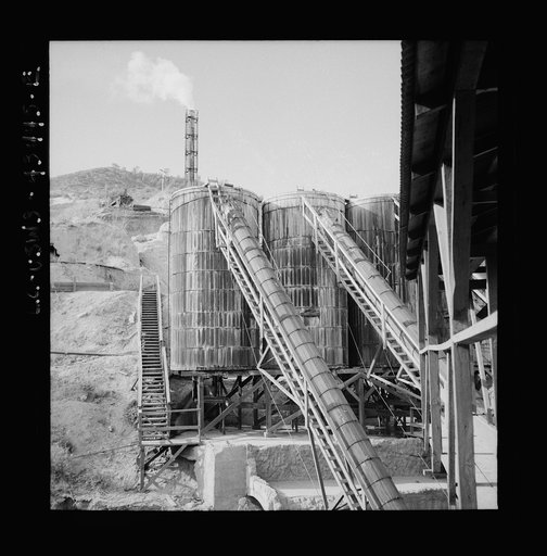 Untitled photo, possibly related to: New Idria, California. A mercury extraction plant of the New Idria Quicksilver Mining Company, where mercury is produced from cinnabar, an ore mined at a number of workings near the plant