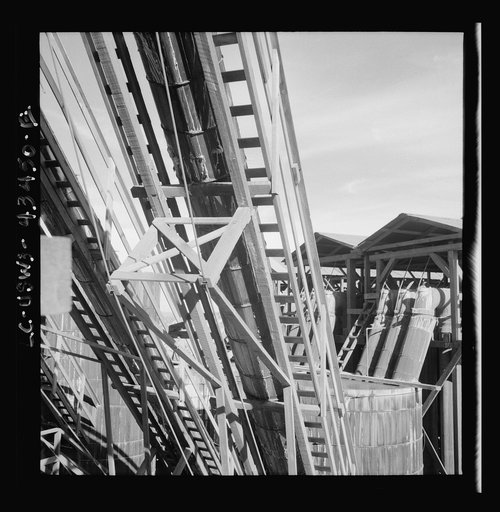 Untitled photo, possibly related to: New Idria, California. Tanks at the mercury extraction plant of the Quicksilver Mining Company where mercury is obtained from cinnabar, an ore mined at a number of workings near the plant
