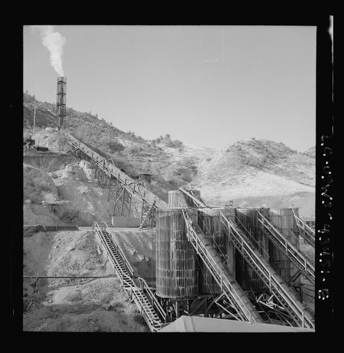 Untitled photo, possibly related to: New Idria, California. Tanks at the mercury extraction plant of the Quicksilver Mining Company where mercury is obtained from cinnabar, an ore mined at a number of workings near the plant