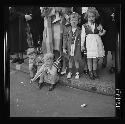 Brooklyn, New York. Children watching the Anniversary Day parade of the Sunday school of the Church of the Good Shepherd