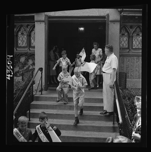 Brooklyn, New York. Children leaving the Sunday school of the Church of the Good Shepherd
