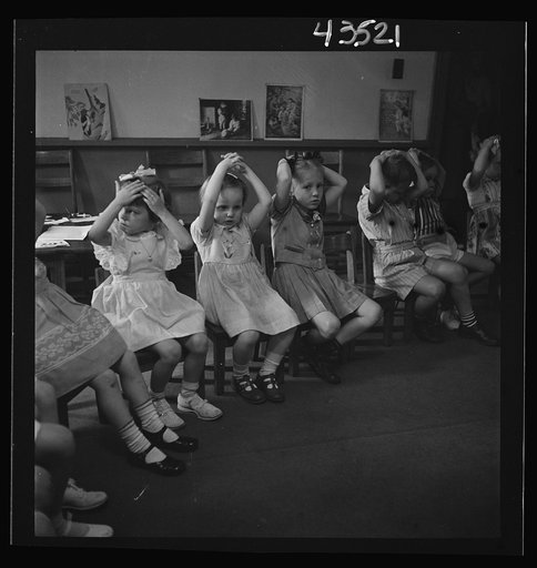 Brooklyn, New York. Relaxation exercise at the Sunday school of the Good Shepherd