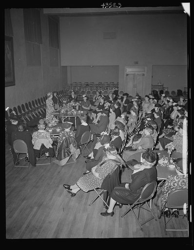 Brooklyn, New York. A woman speaker addressing the church women at the community house of the Church of the Good Shepherd