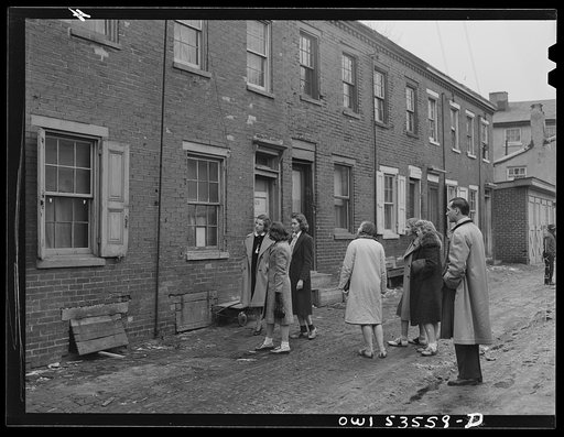 Wilmington, Delaware. Tower Hill School, noted country day school for pupils from three to eighteen years of age. Some of the high school pupils of a social science class apparently studying alley dwellings