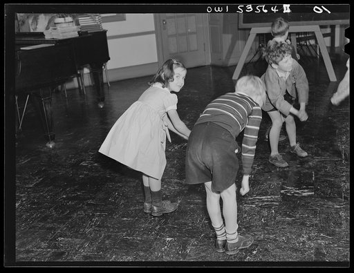 Wilmington, Delaware. Tower Hill School, noted country day school for pupils from three to eighteen years of age. Small boys and girls learning a game or dance