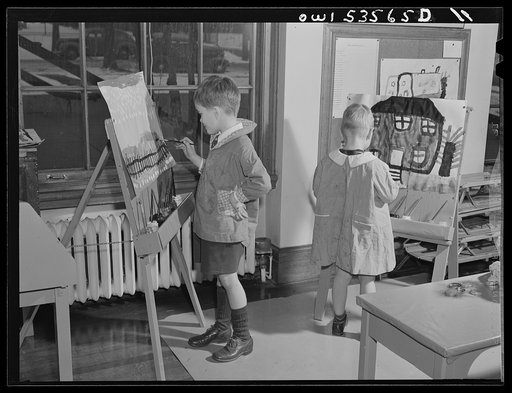 Wilmington, Delaware. Tower Hill School, noted country day school for pupils from three to eighteen years of age. Two small boys at easels in one of the school's art classes
