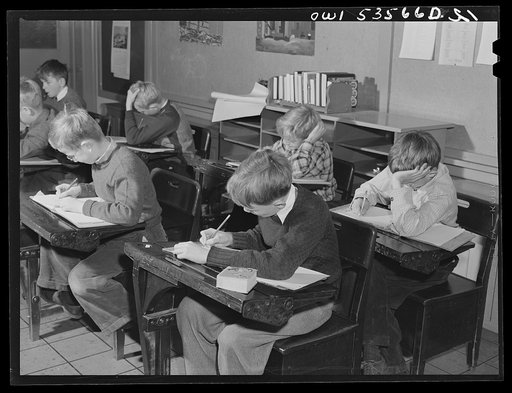 Untitled photo, possibly related to: Wilmington, Delaware. Tower Hill School, noted country day school for pupils from three to eighteen years of age. An elementary grade classroom showing some of the girls writing in notebooks