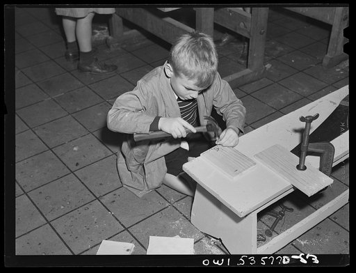 Wilmington, Delaware. Tower Hill School, noted country day school for pupils from three to eighteen years of age. A small boy learning how to drive nails