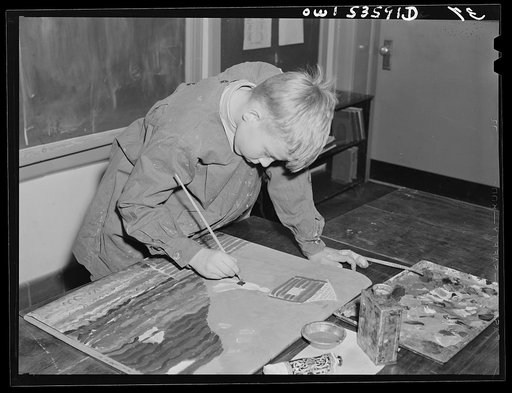 Wilmington, Delaware. Tower Hill School, noted country day school for pupils from three to eighteen years of age. A young boy painting