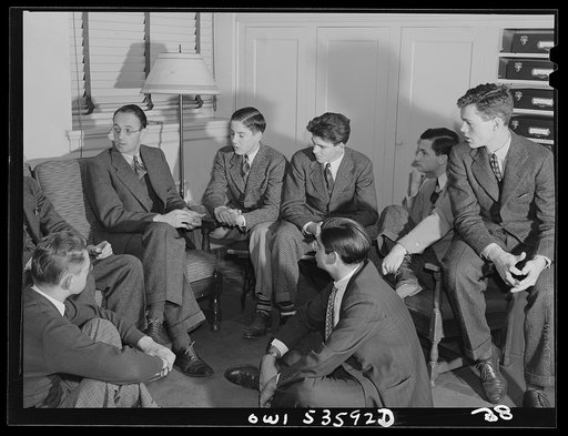 Untitled photo, possibly related to: Wilmington, Delaware. Tower Hill School, noted country day school for pupils from three to eighteen years of age. A group of boys gathering informally with an instructor