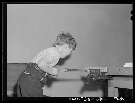 Wilmington, Delaware. Tower Hill School, noted country day school for pupils from three to eighteen years of age. A boy learning to use a saw