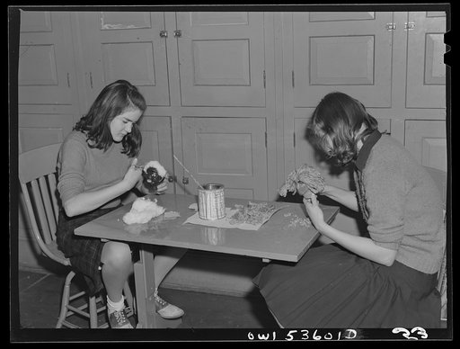Wilmington, Delaware. Tower Hill School, noted country day school for pupils from three to eighteen years of age. Two girls of the doll-making class