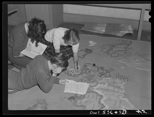 Wilmington, Delaware. Tower Hill School, noted country day school for pupils from three to eighteen years of age. Young students drawing a large map of the natural resources of the world