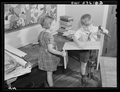 Wilmington, Delaware. Tower Hill School, noted country day school for pupils from three to eighteen years of age. A small boy learning how to use a hammer without hitting his fingers, while a little girl assists him by steadying the small wooded desk he is making