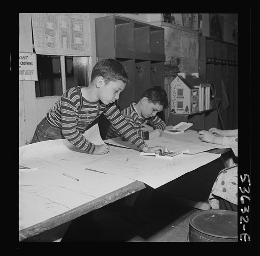 New York, New York. Two young boys, sons of working mothers, making drawings at Greenwich House, a community center where they are receiving day care