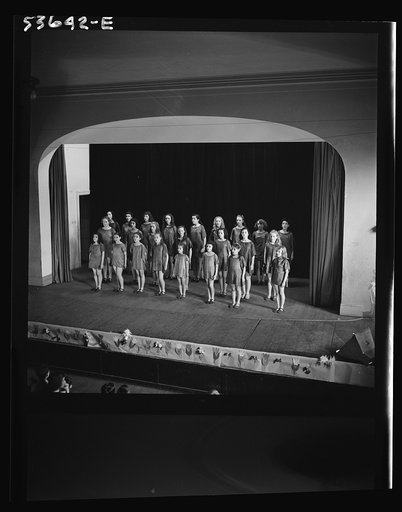 New York, New York. Children of working mothers who receive day care at Greenwich House on Saturdays and after school hours, enjoying a dancing and singing class at this community center