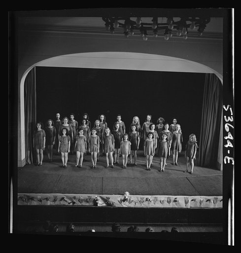 New York, New York. Children of working mothers, who receive day care at the Greenwich House on Saturdays and after school, enjoying a dancing and singing class at this community center