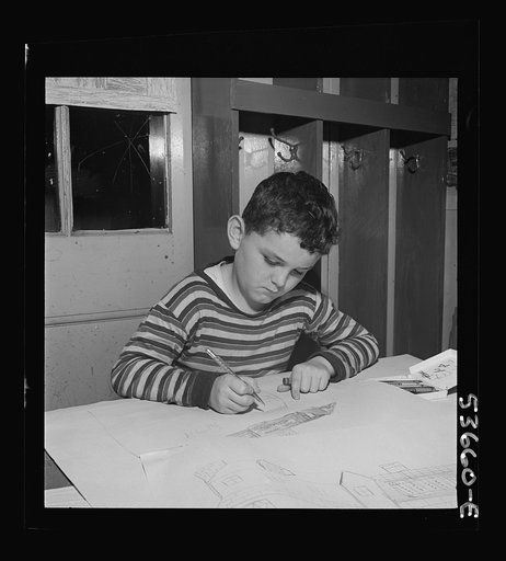 New York, New York. A young draftsman drawing plans for a house and developing his favorite hobby at Greenwich house where he received day care while his mother works