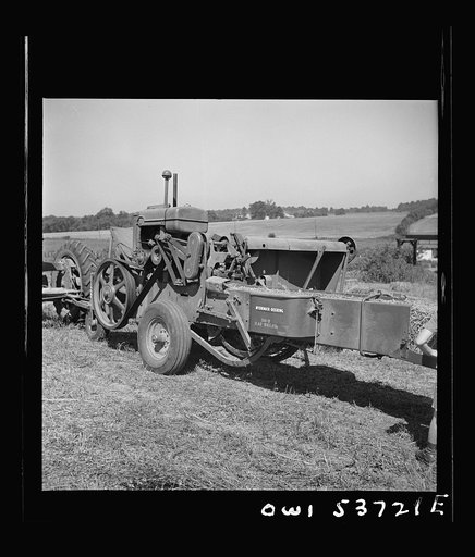 Dresher, Pennsylvania. Baling machine operating at the Spring Run Farm