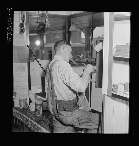 West Danville, Vermont. Mr. Hastings in his general store taking an order over the telephone