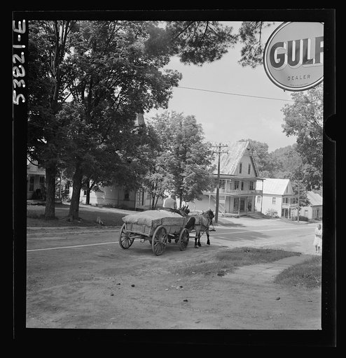 West Danville, Vermont. A load of sawdust from the lumber mill. The wagon saves gas and rubber