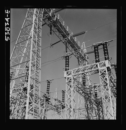 Las Vegas, Nevada. A mass of transmission towers and transformers redistributing power from Boulder Dam to Basic Magnesium Incorporated, which produces huge quantities of the lightest of all metals for aircraft and other wartime manufacturing