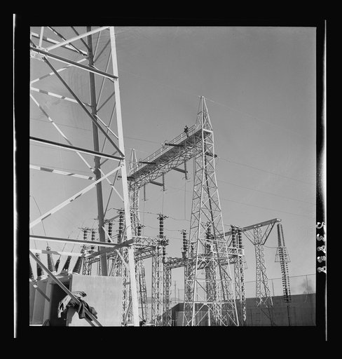 Las Vegas, Nevada. A mass of transmission towers and transformers redistributing power from Boulder Dam to Basic Magnesium Incorporated, which produces huge quantities of the lightest of all metals for aircraft and other wartime manufacturing