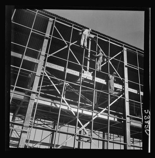 Las Vegas, Nevada. Painters at work seventy feet above ground on the gigantic construction of the Basic Magnesium Incorporated plant in the southern Nevada desert