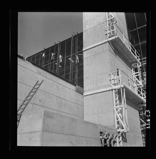 Las Vegas, Nevada. Painters at work seventy feet above ground on the gigantic construction of the Basic Magnesium incorporated plant in the southern Nevada desert