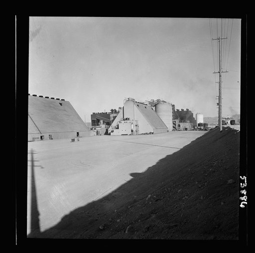 Las Vegas, Nevada. Peat storage buildings, silos for the storage of ore, and other structures of the Basic Magnesium Incorporated plant in the southern Nevada desert