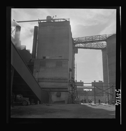 Untitled photo, possibly related to: Las Vegas, Nevada. A giant silo and part of the buildings on the grounds of Basic Magnesium Incorporated