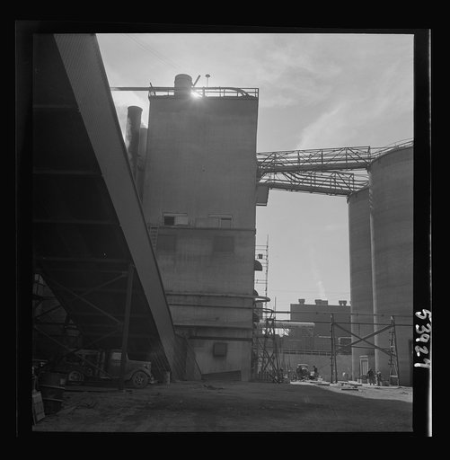 Untitled photo, possibly related to: Las Vegas, Nevada. A giant silo and part of the buildings on the grounds of Basic Magnesium Incorporated