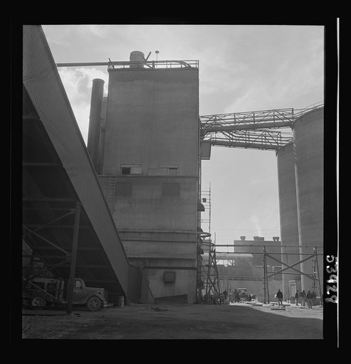 Untitled photo, possibly related to: Las Vegas, Nevada. A giant silo and part of the buildings on the grounds of Basic Magnesium Incorporated
